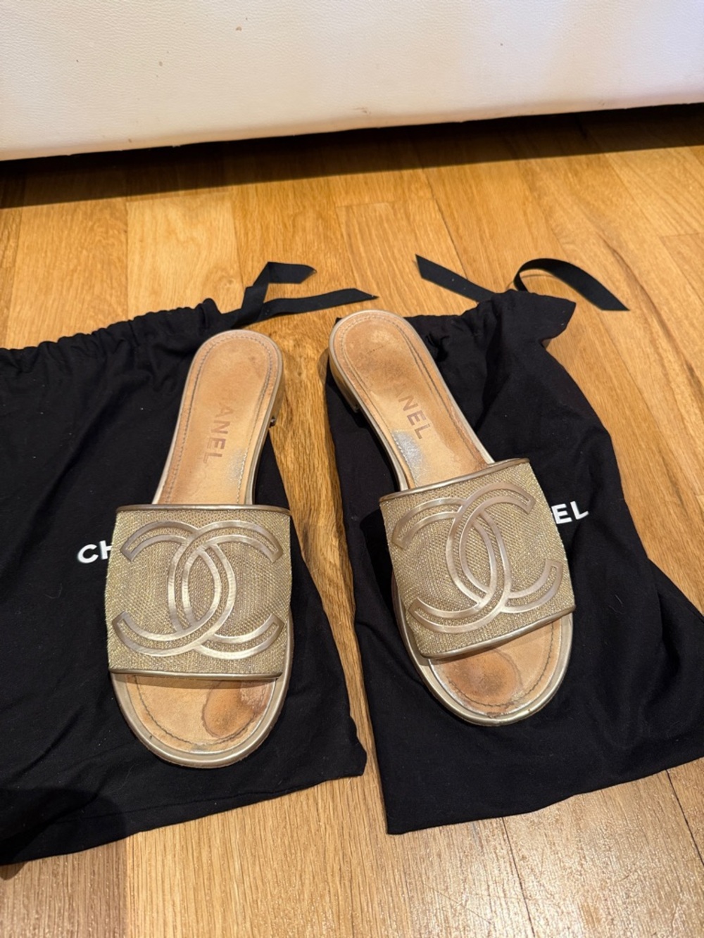 CHANEL Metallic Gold Slide Sandals with Interlocking CC